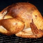 Cajun Smoked Turkey on a grill.