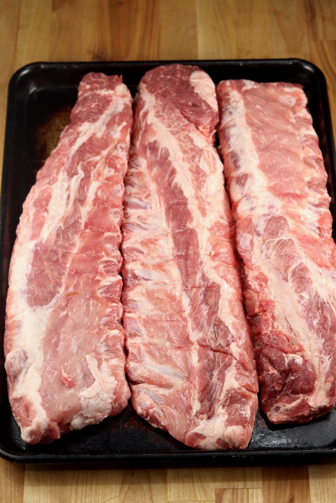 Maple Glazed Ribs are incredibly flavorful and delicious. A great meal to prepare on the grill to feed a hungry crowd. 