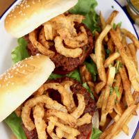 Mustard BBQ Sauce Burgers with onion strings and fries