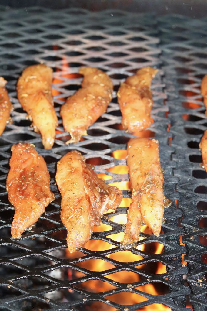 Grilling marinated chicken tenders