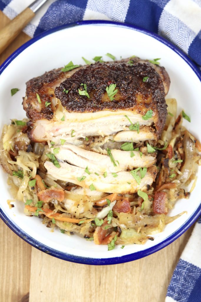 Chicken thighs with brown sugar rub over fried cabbage