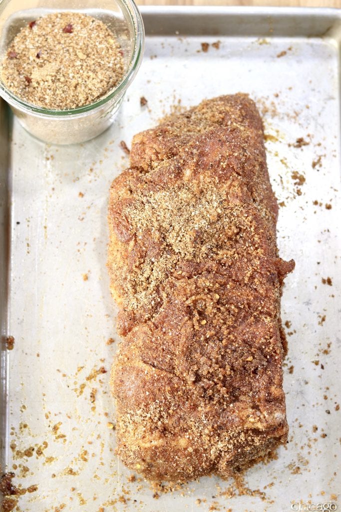Pork shoulder with dry rub on a sheet pan
