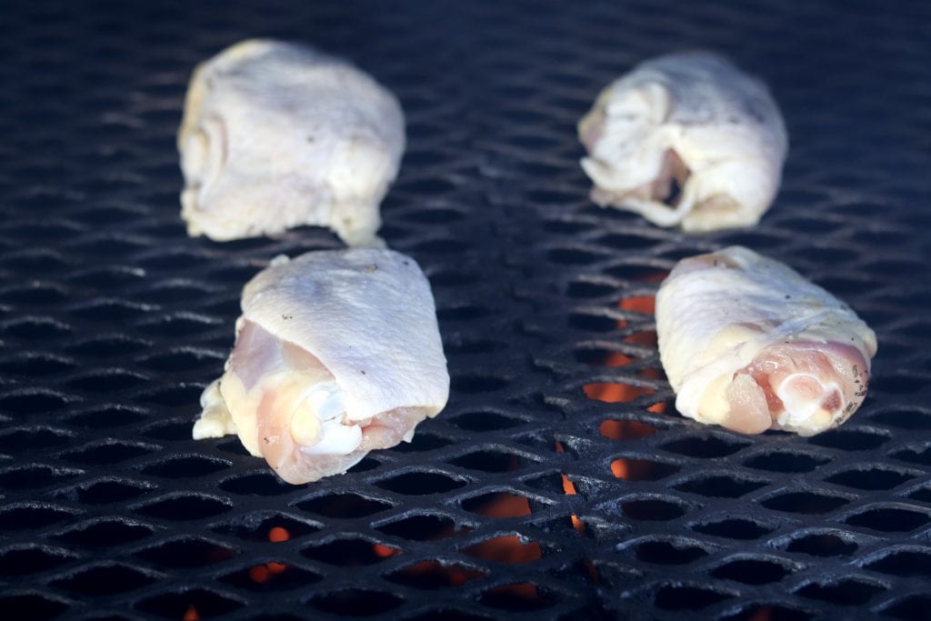 Chicken thighs on a grill
