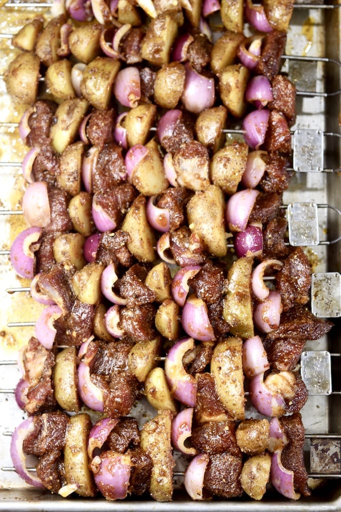 Grilled steak and potato kabobs on a sheet pan