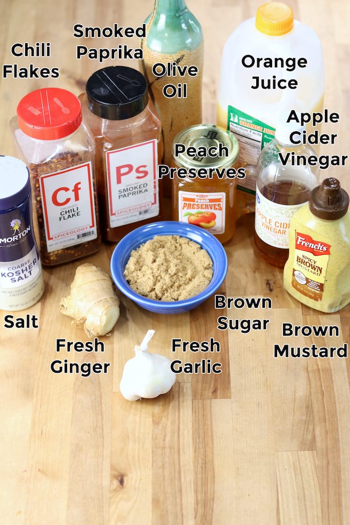 Ingredients for Peach BBQ Sauce: garlic, ginger, salt, smoked paprika, chili flakes, olive oil, peach preserves, orange juice, apple cider vinegar, brown mustard, brown sugar