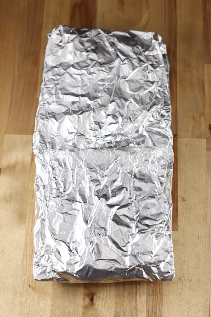 Foil packet filled with potatoes for grilling