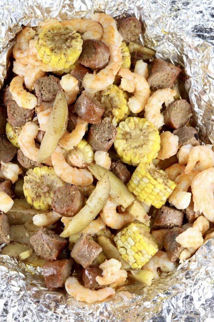 Family style foil packet with shrimp, smoked sausage, potatoes, onions and corn on the cob