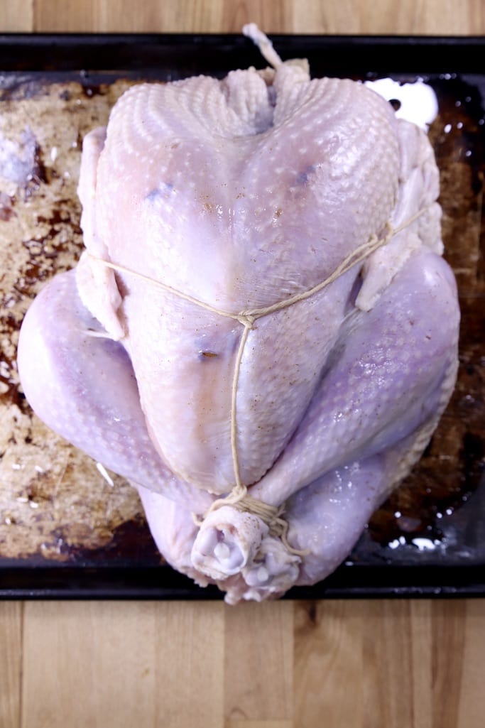 trussed turkey on a sheet pan