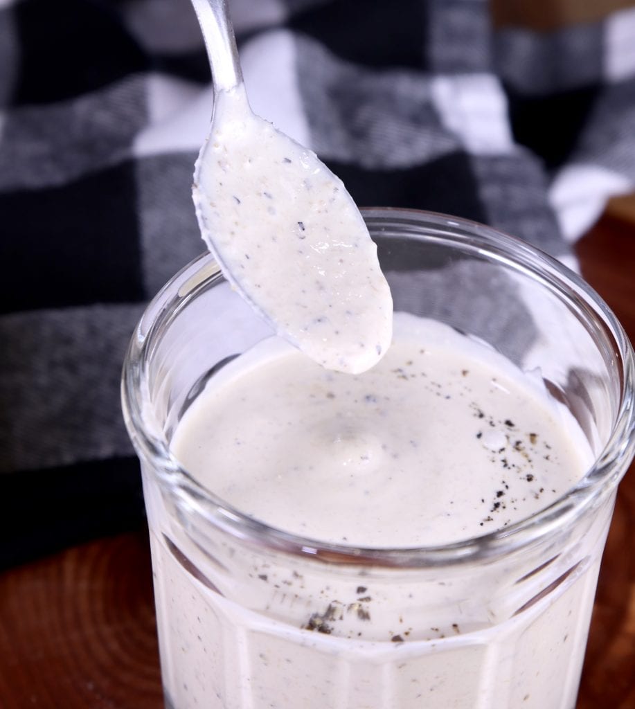 Spoonful of horseradish sauce from a jar