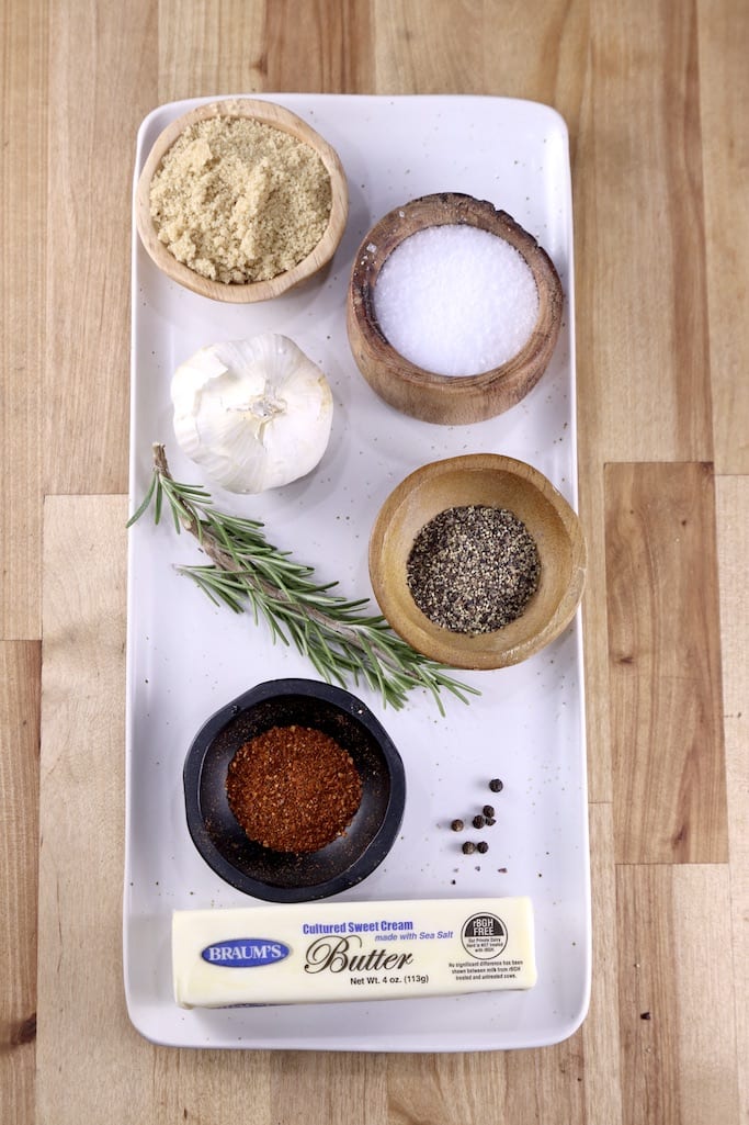 platter with garlic and rosemary butter ingredients in bowls