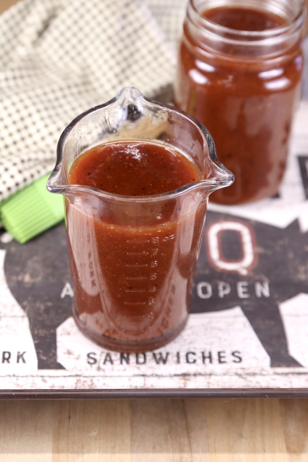 Jars of Maple BBQ Sauce on a tray