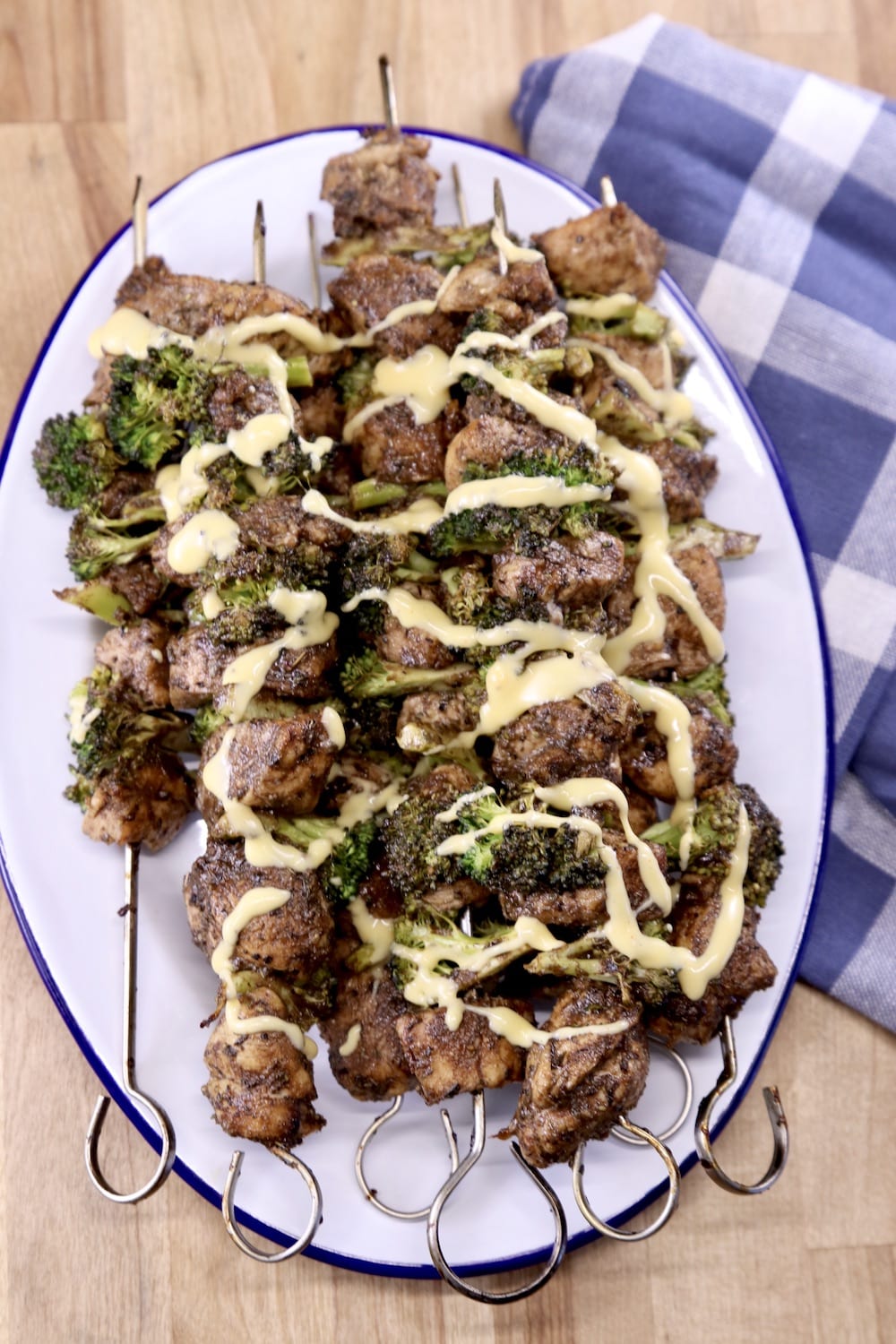 Balsamic Chicken Broccoli Skewers with cheese sauce