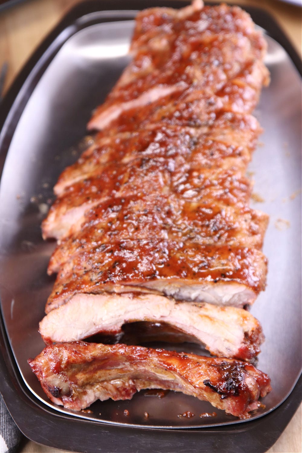 Tray of maple bbq ribs, sliced