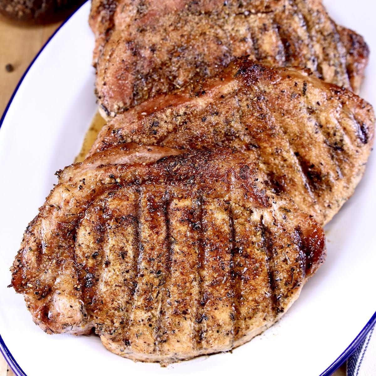 Garlic and Onion Grilled Pork Chops on a platter