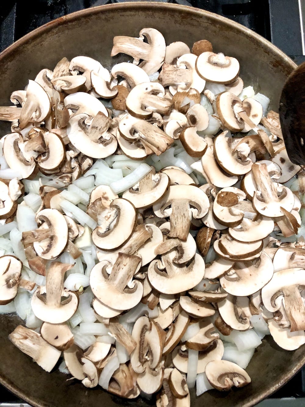 skillet of mushrooms and onions