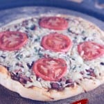 Brisket Pizza on the grill - text overlay