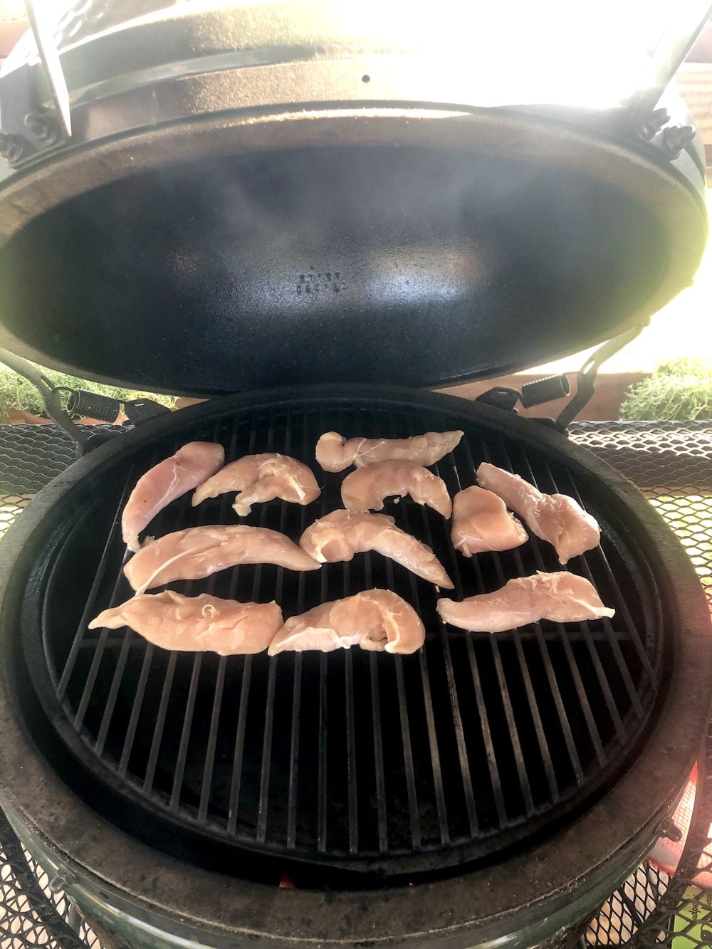 chicken tenders on a big green egg grill