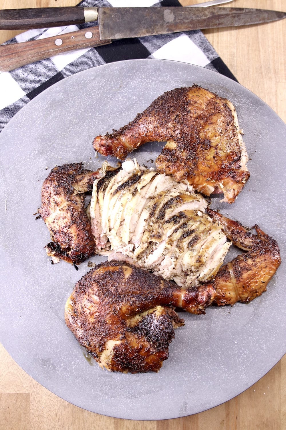 Platter of whole chicken, sliced and pieces