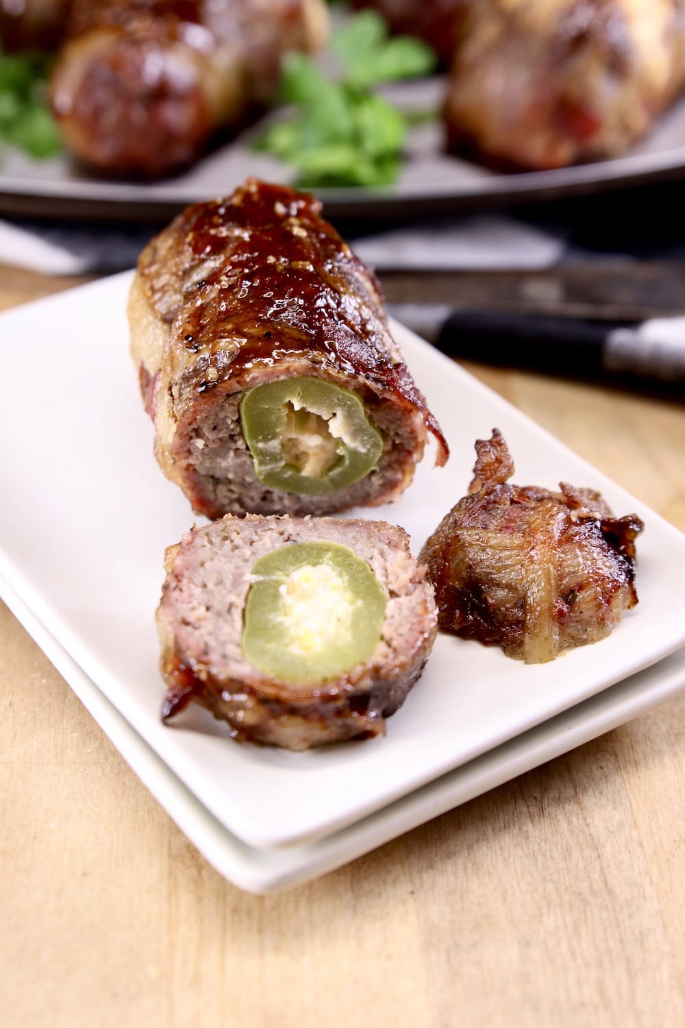 Armadillo Egg - sausage and bacon wrapped jalapeño poppers
