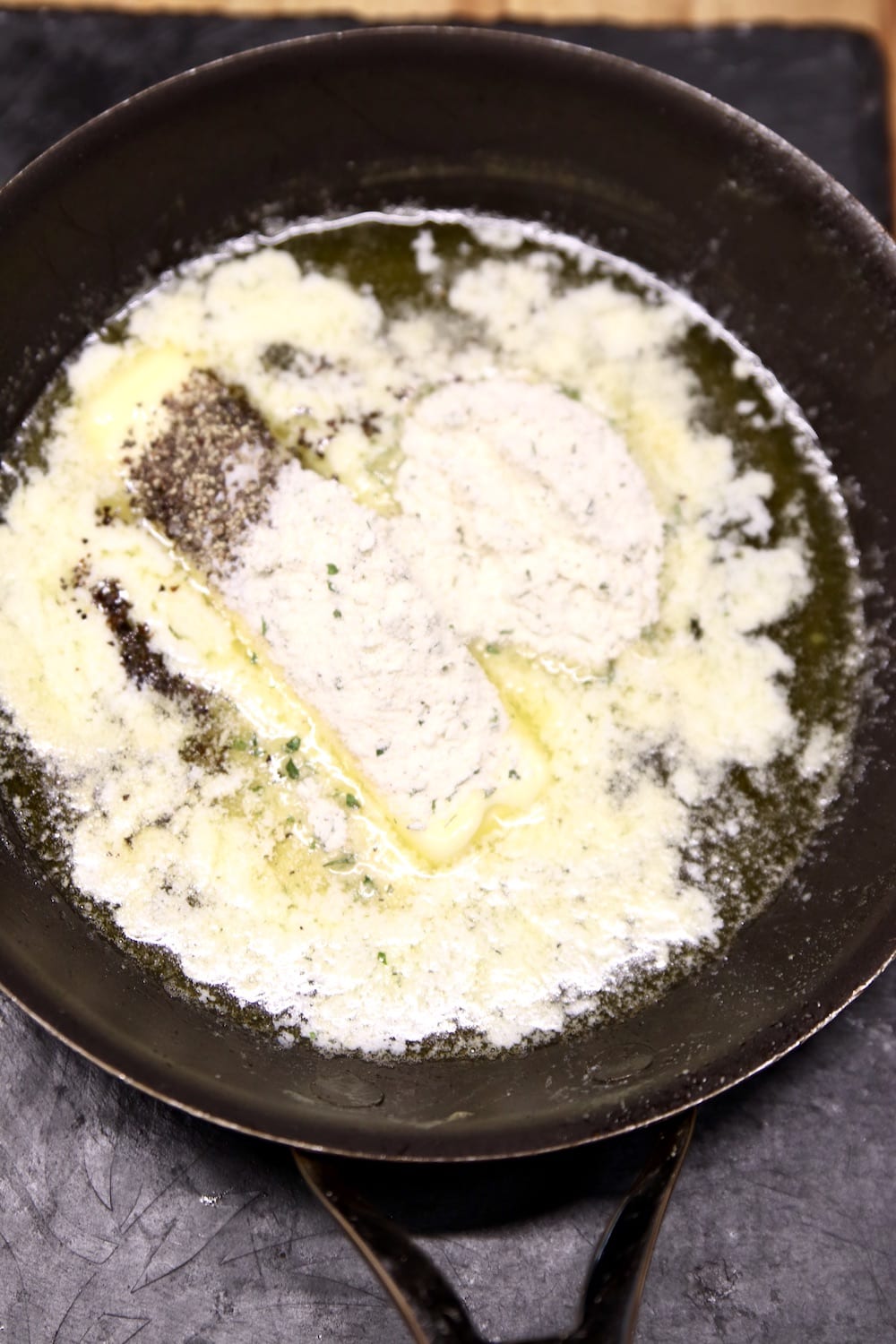 melted butter with ranch dressing mix in a skillet