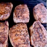Grilled Garlic & Herb Pork Chops with text overlay