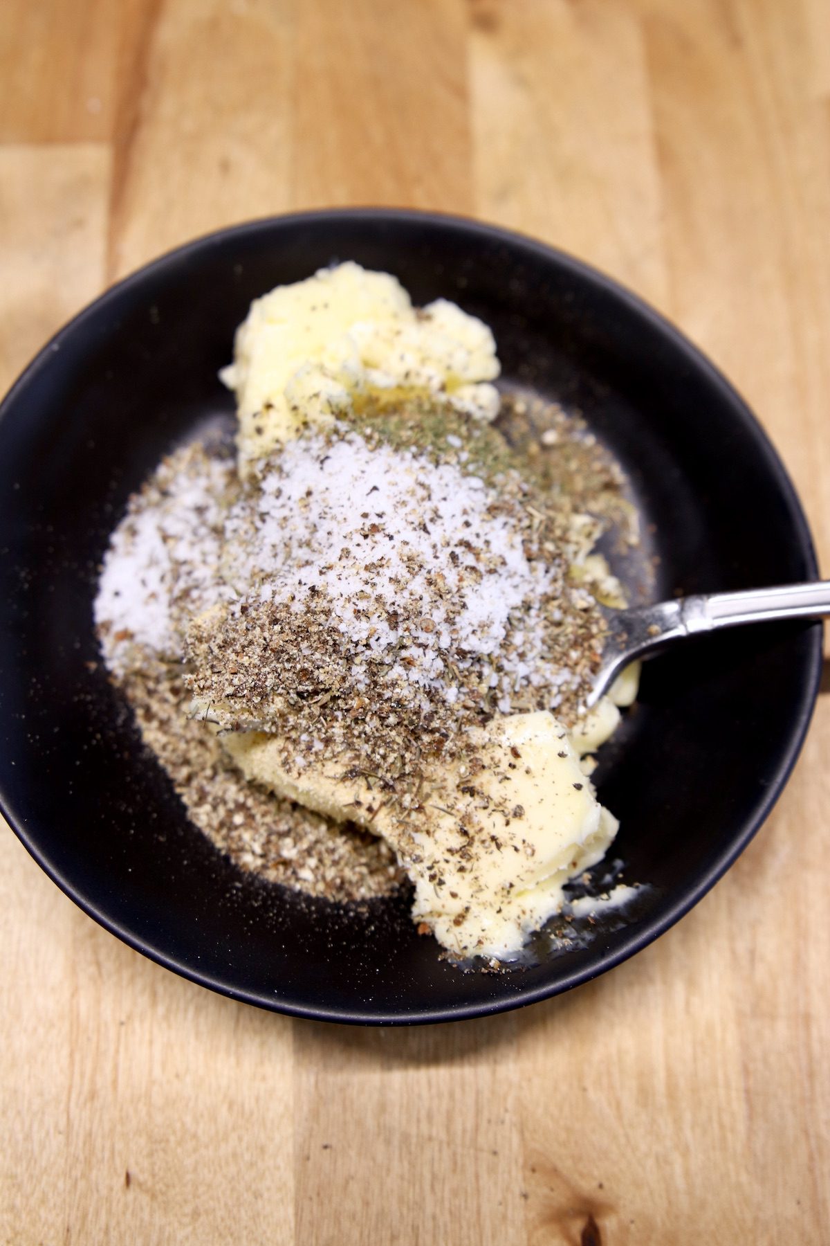 Garlic butter and herbs - in a bowl, not mixed