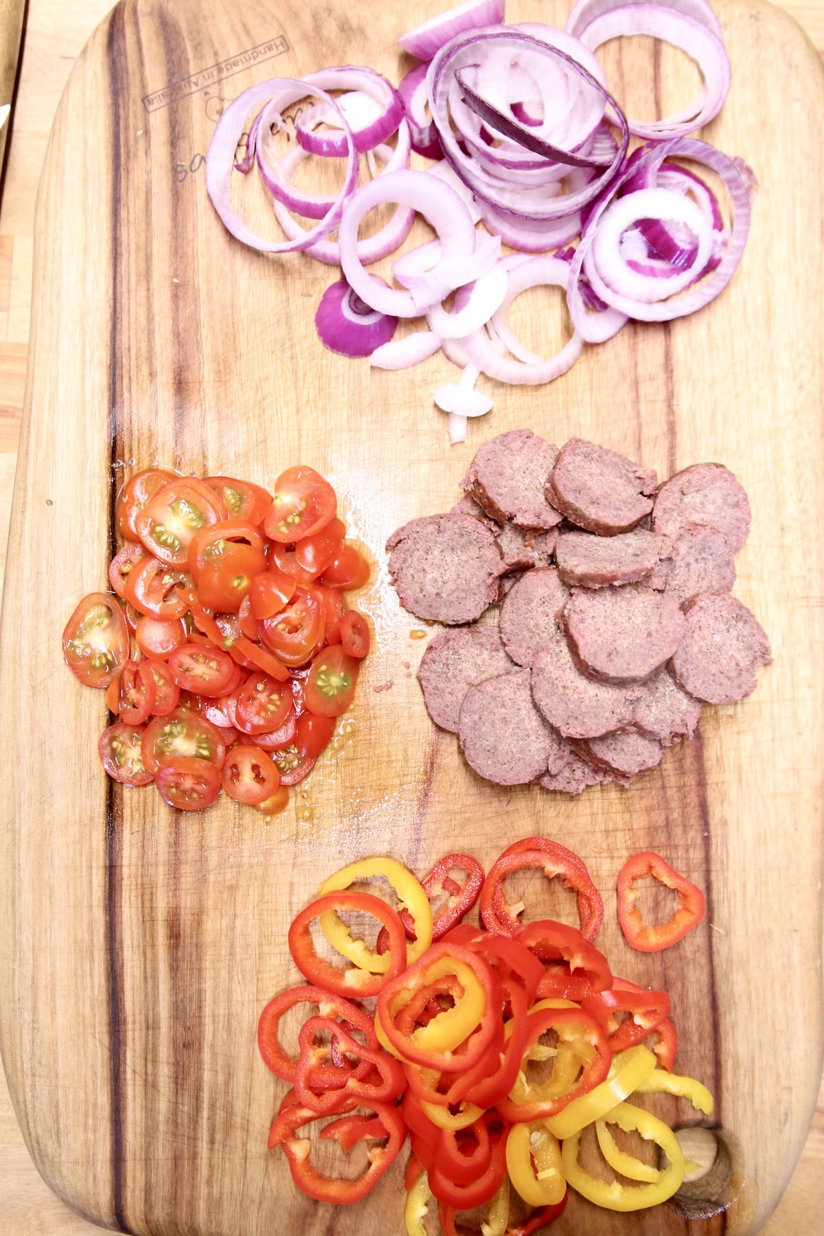 sliced onion, peppers, tomatoes, smoked sausage