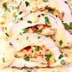 sliced chicken breasts with ham and cheese stuffing