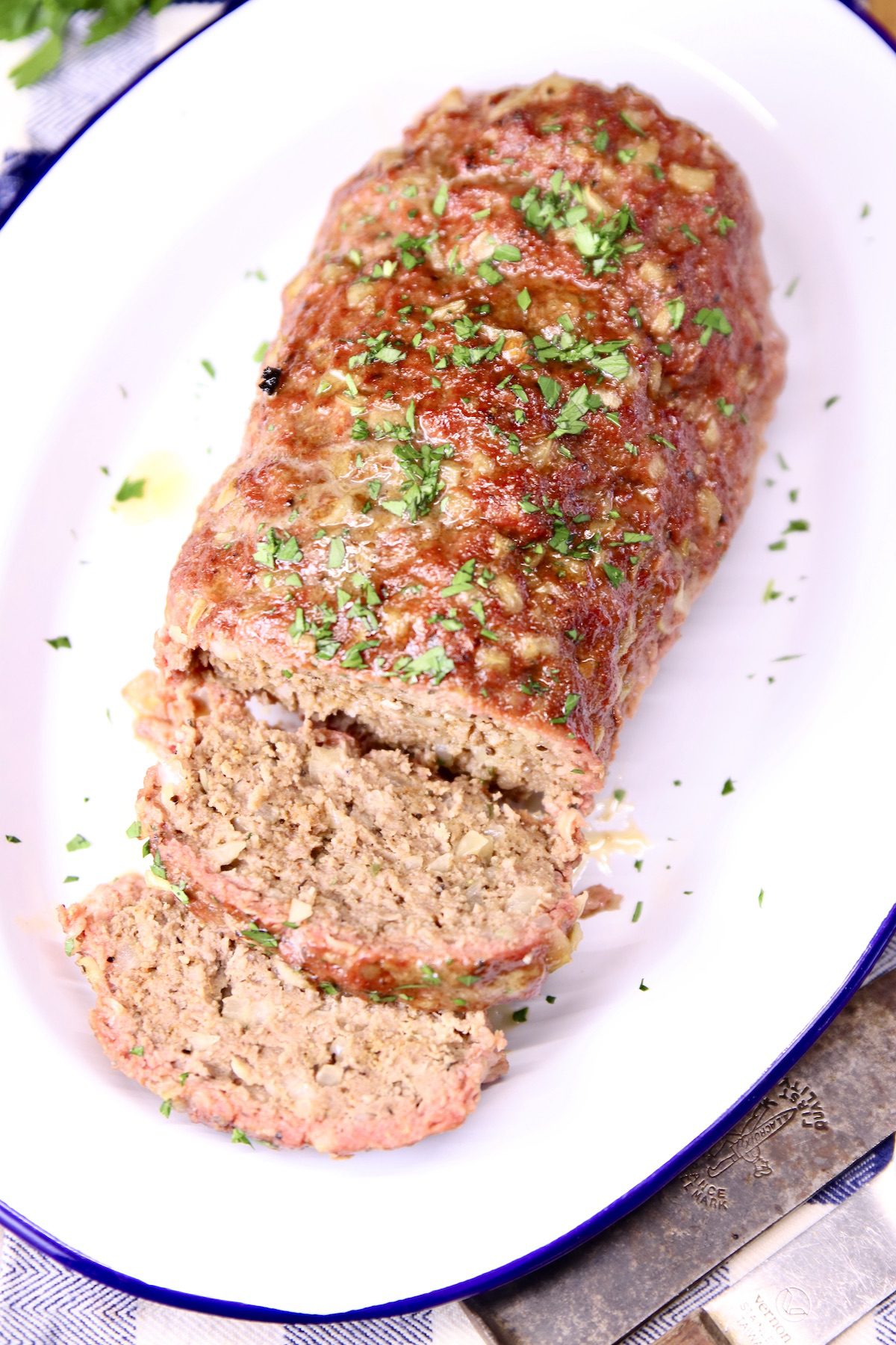 Grilled meatloaf - overhead view - partially sliced