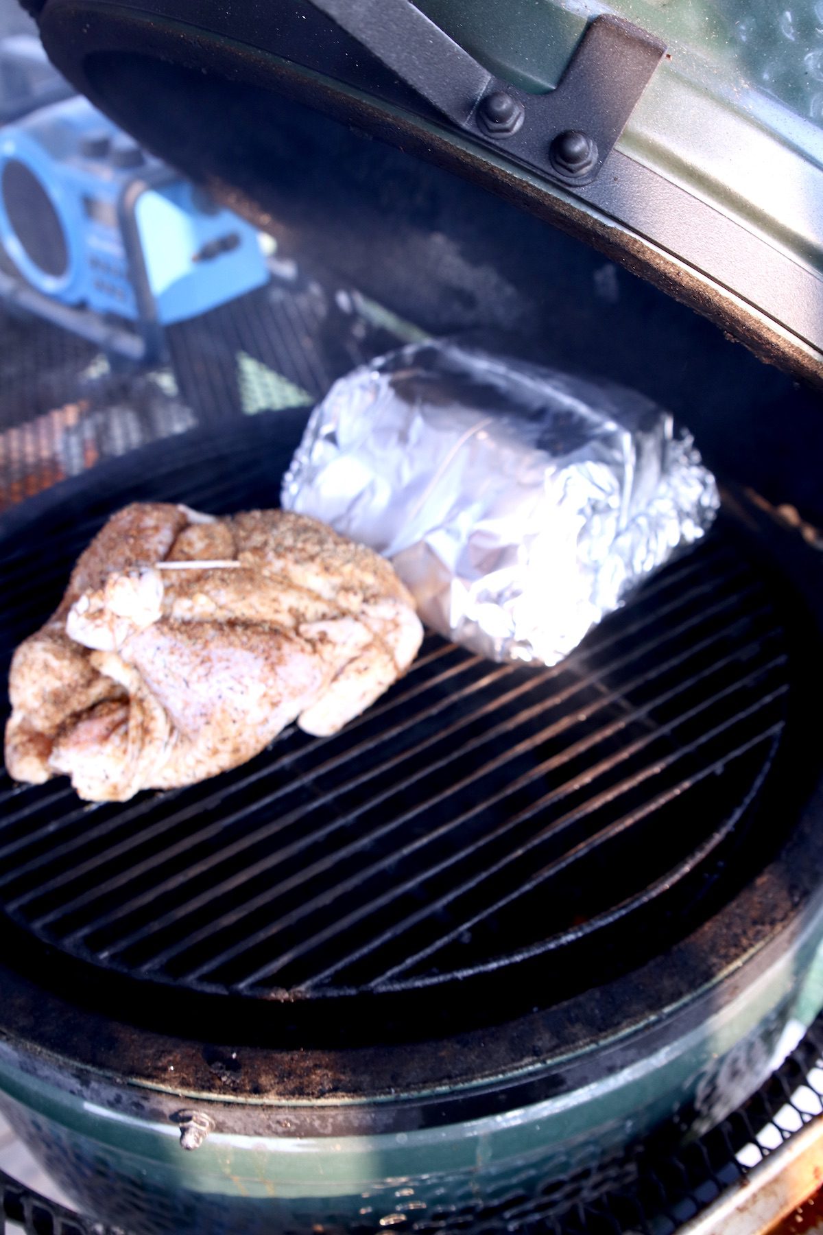 foil packet corn with a whole chicken on the grill