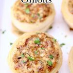 Stuffed onions on a platter- text overlay