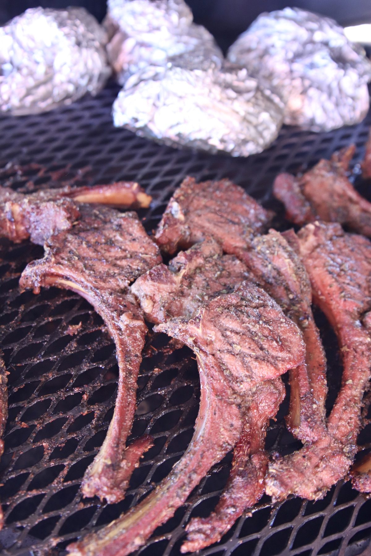 grilled venison chops on a grill