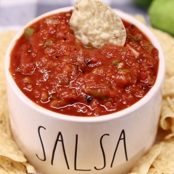 chunky salsa in a bowl with a tortilla chip
