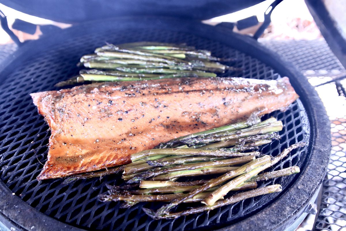 whole salmon filet and asparagus on grill