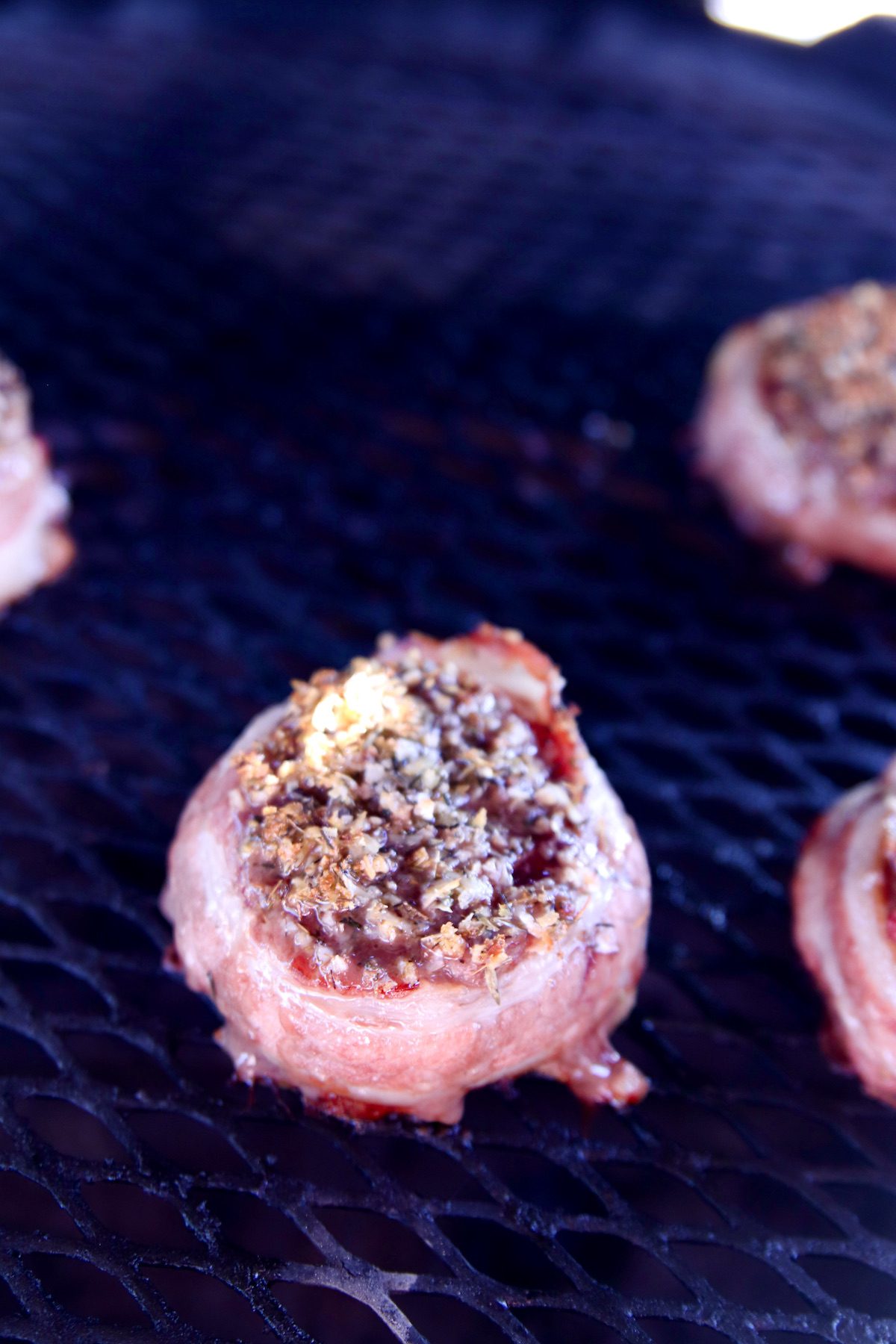 grilling filet mignon wrapped in bacon with parmesan crust