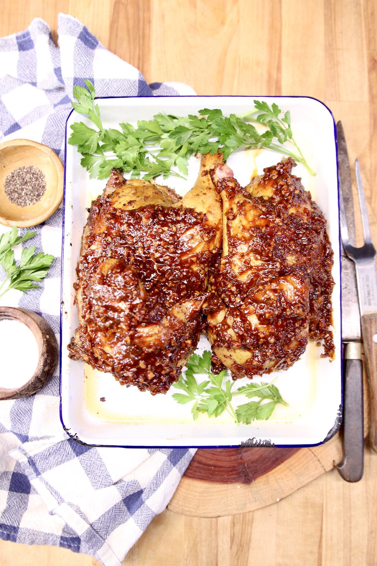grilled bbq chicken - half chickens on platter