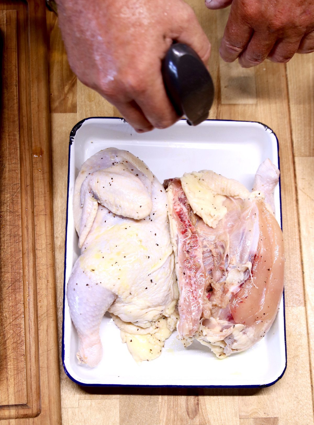 preparing chicken for grilling with olive oil