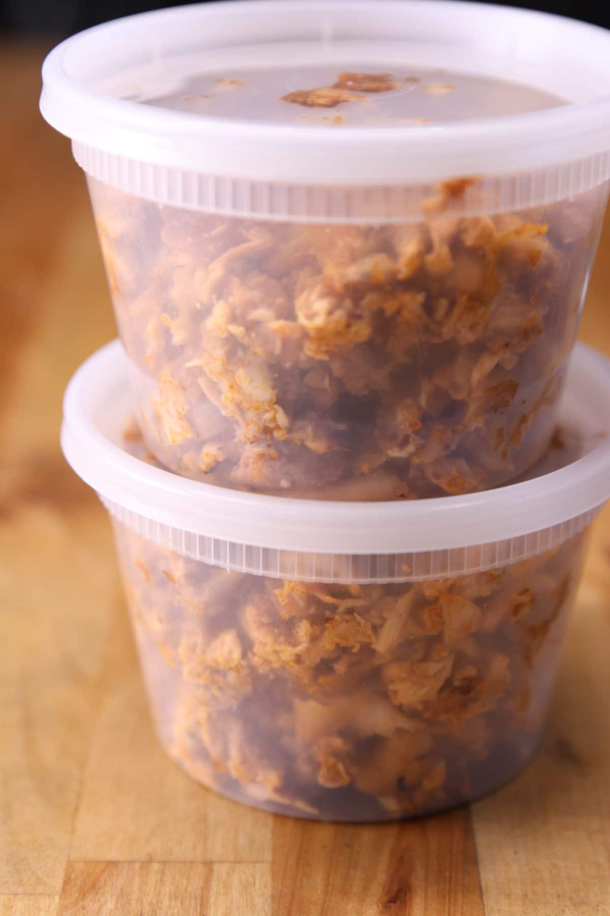 2 deli containers of bbq chicken