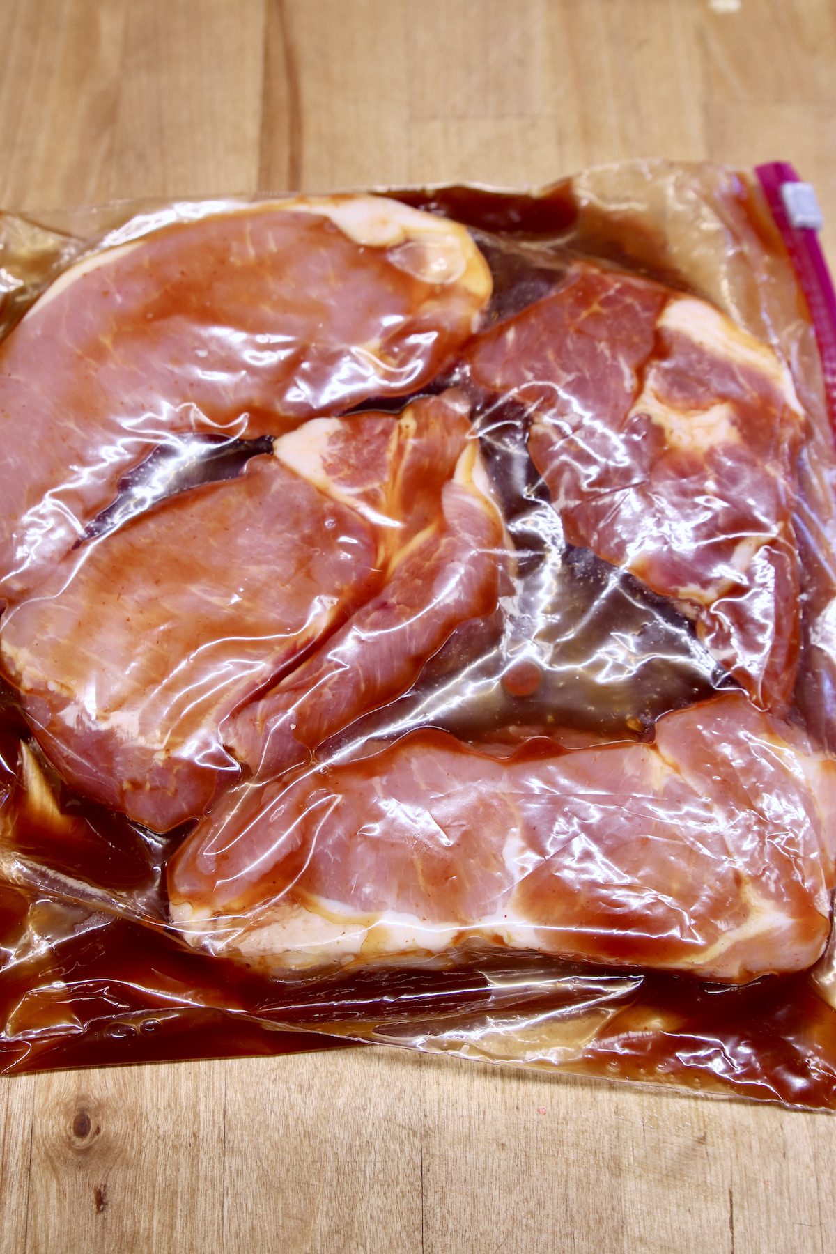 marinating pork chops in a baggie.