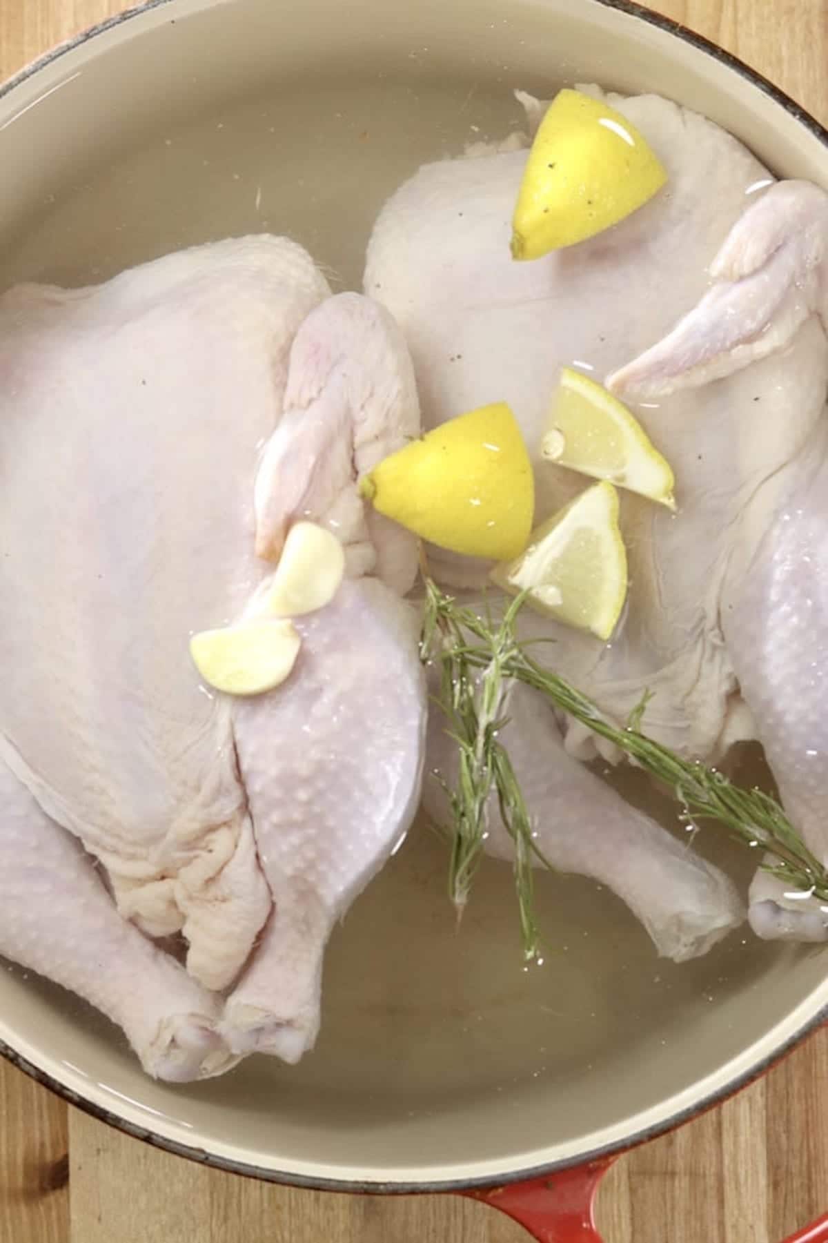 chickens in brine with lemons, herbs