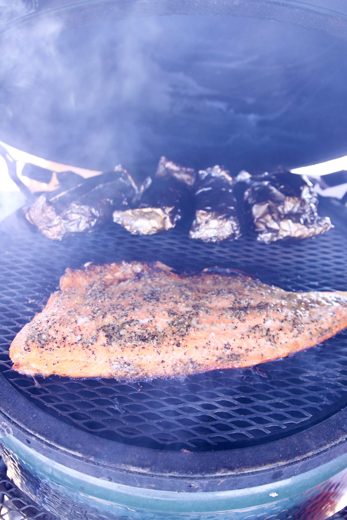 grilling salmon on a big green egg grill.