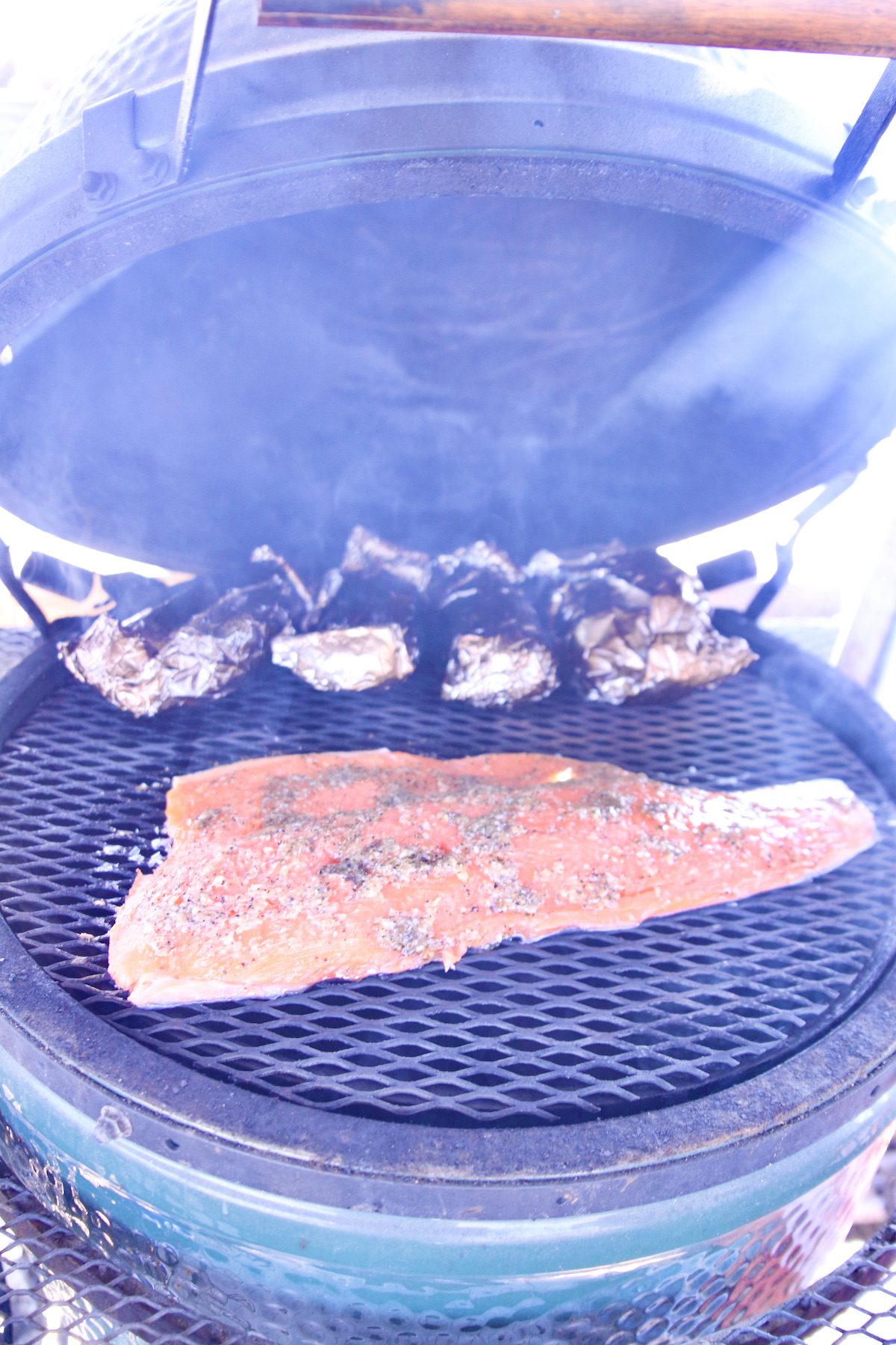 salmon fillet on a grill .