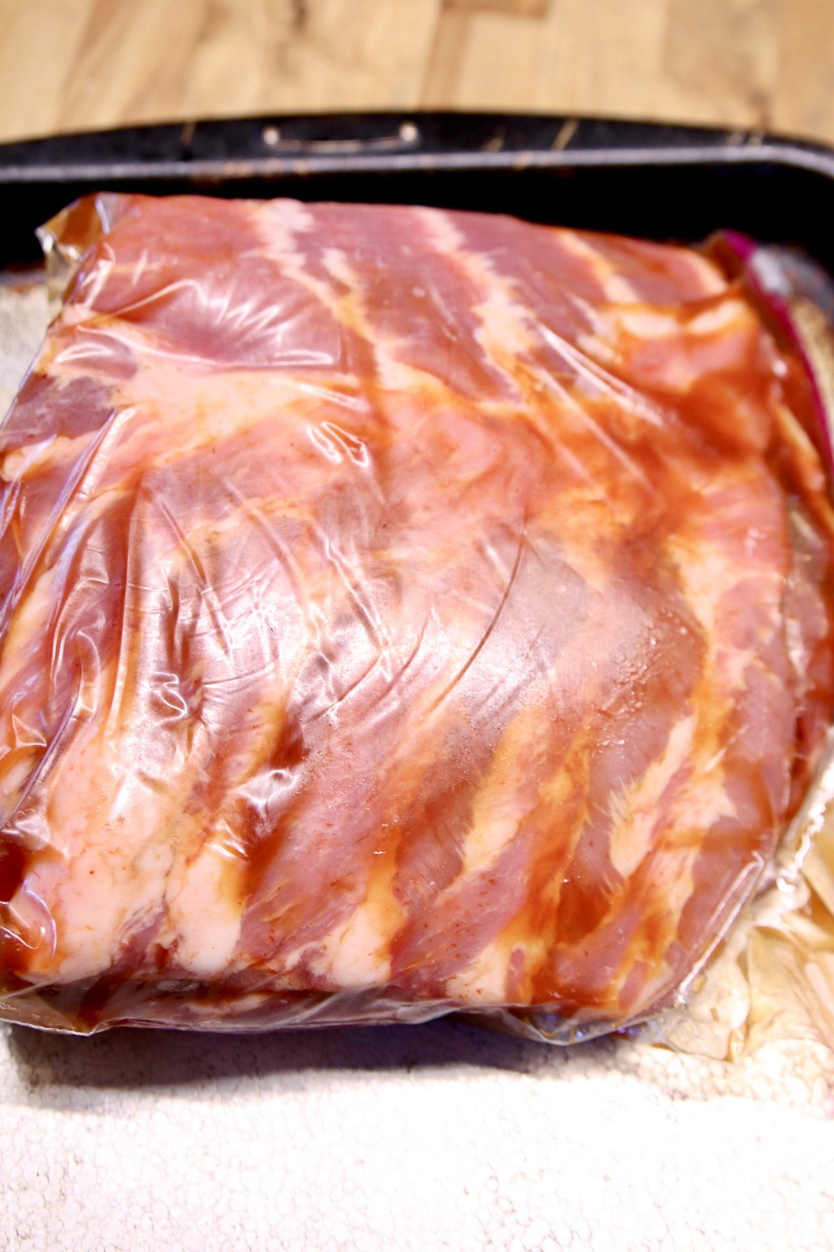 marinating spare ribs in a zip top bag.