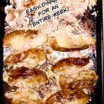 "meal prep chicken" text overlay with grilled chicken breasts on a sheet pan.