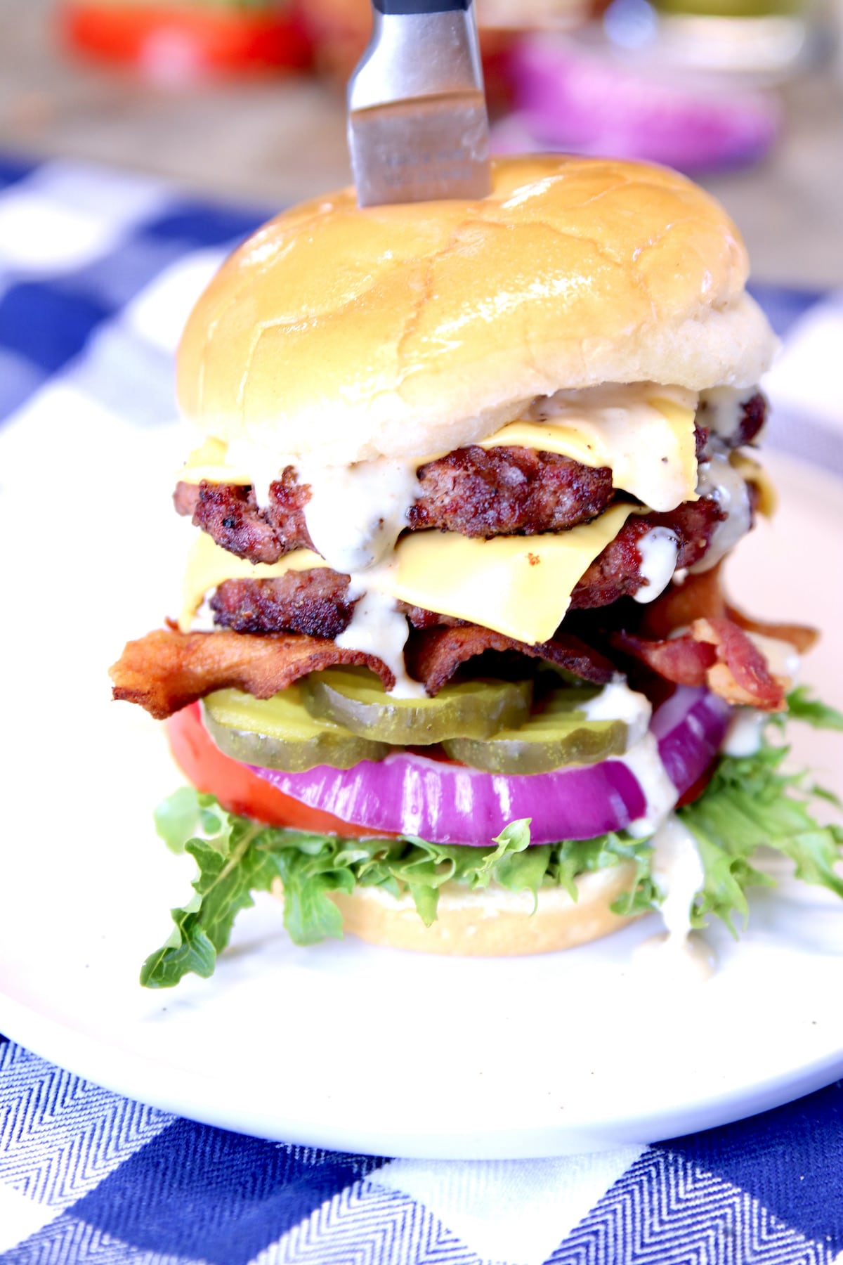 Bacon Double Cheeseburger - closeup on a plate.