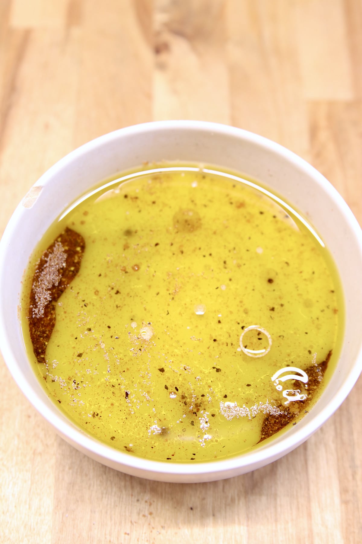 Orange juice and olive oil added to fajita seasoning.