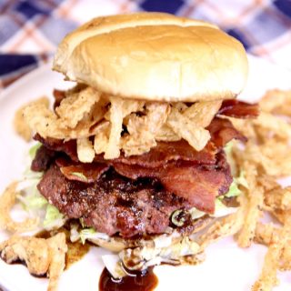 Steakhouse burger with bacon and onion strings.