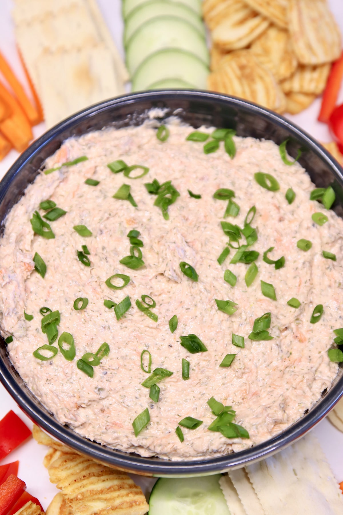 Salmon Dip in a bowl on a vegetable platter.