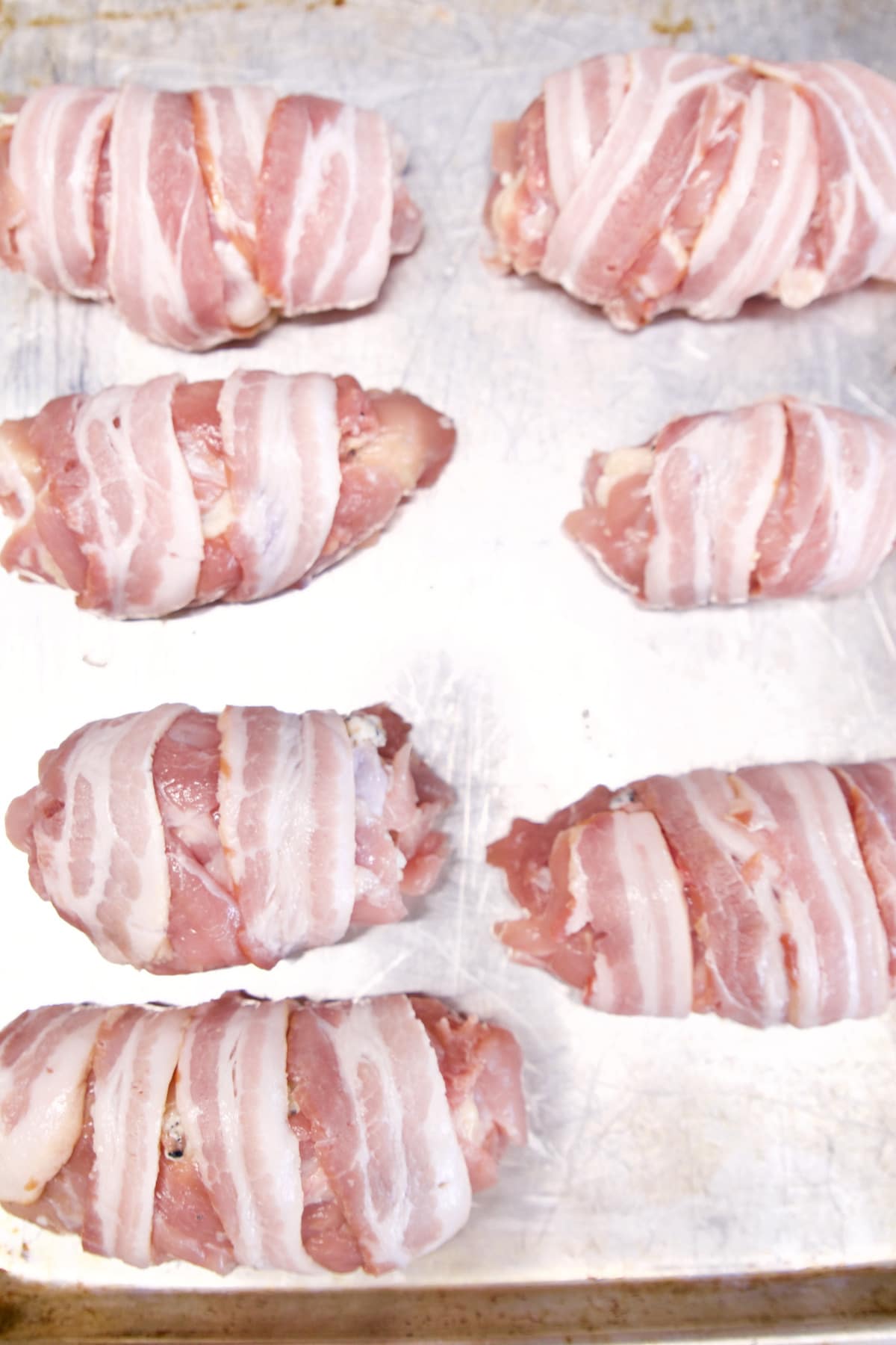 Bacon wrapped chicken rolls.