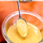 Spoon dipping honey mustard sauce. Text overlay.